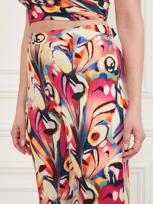 GUESS pantalón acampanado anís mujer 0P8X2082 impresión del país de las maravillas vestir