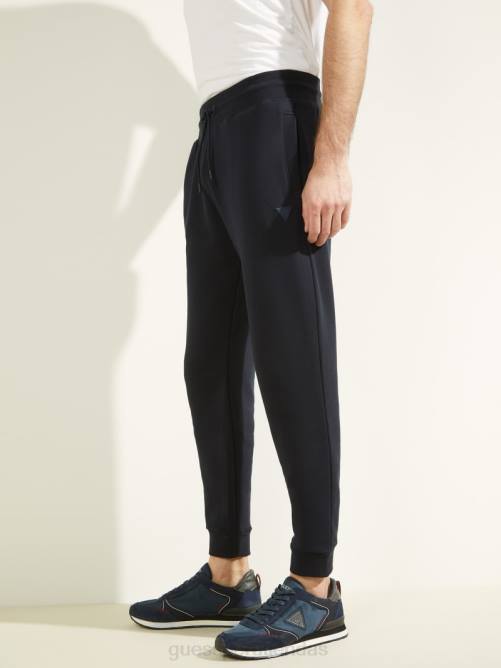GUESS pantalones ecológicos con logo Aldwin hombres 0P8X4170 marino profundo vestir